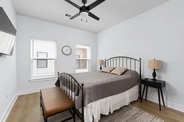 a view of a room with wooden floor and closet