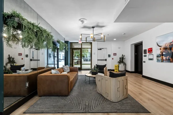 a view of a building with sitting area