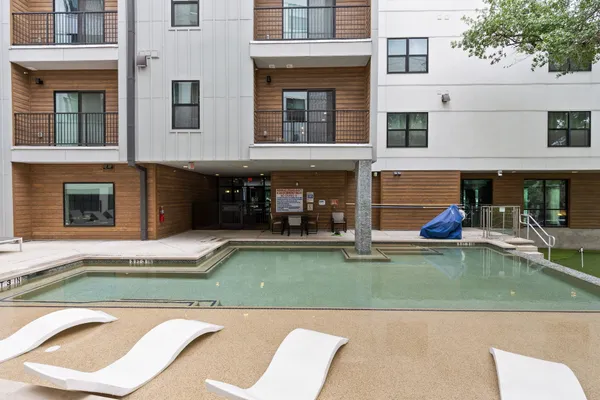 a view of an buildings with swimming pool