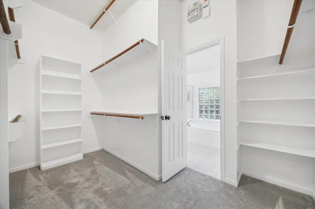 a view of an empty walk in closet