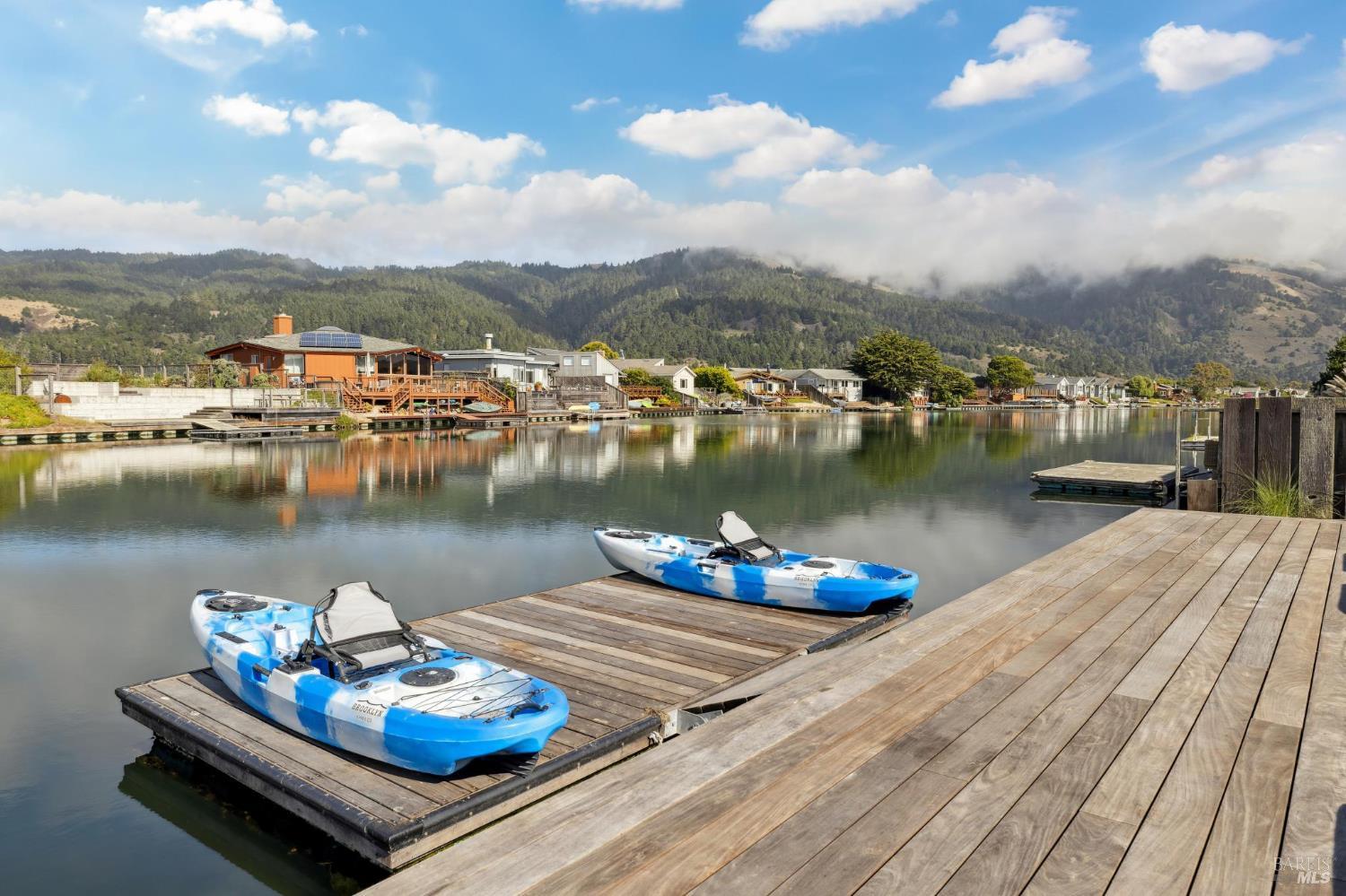 297 Seadrift Road Stinson Beach, CA 94970 - Photo 25 of 44 a view of a lake with couches chairs