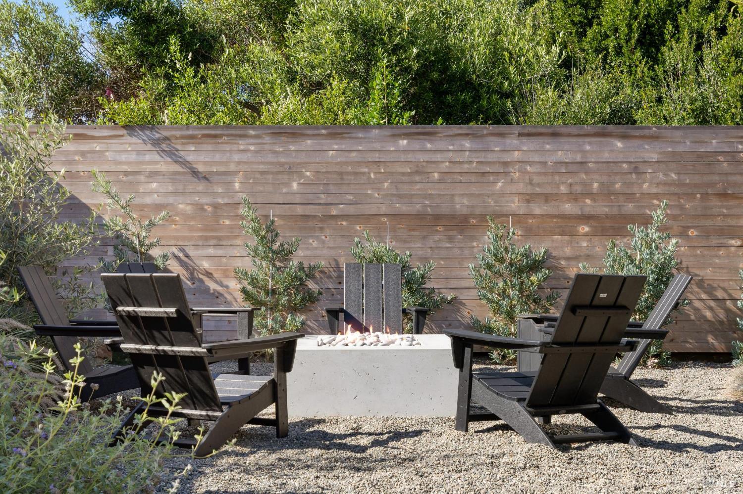 297 Seadrift Road Stinson Beach, CA 94970 - Photo 38 of 44 a backyard of a house with outdoor seating