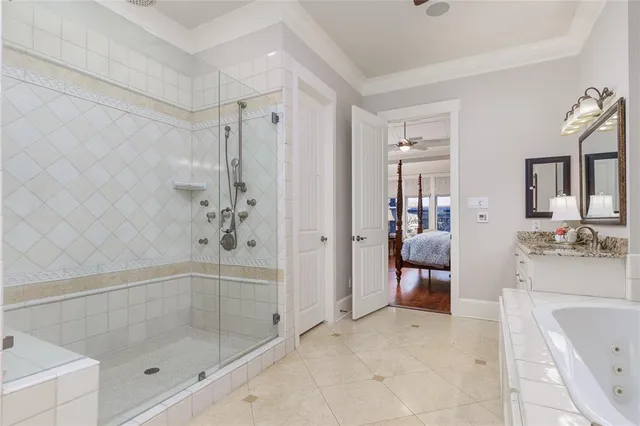 a bathroom with a bathtub shower sink and toilet