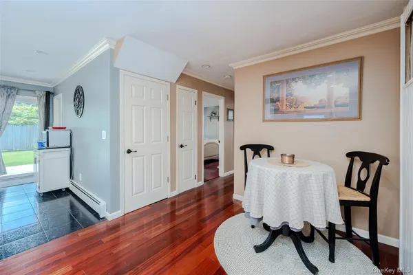 a workspace with furniture and wooden floor