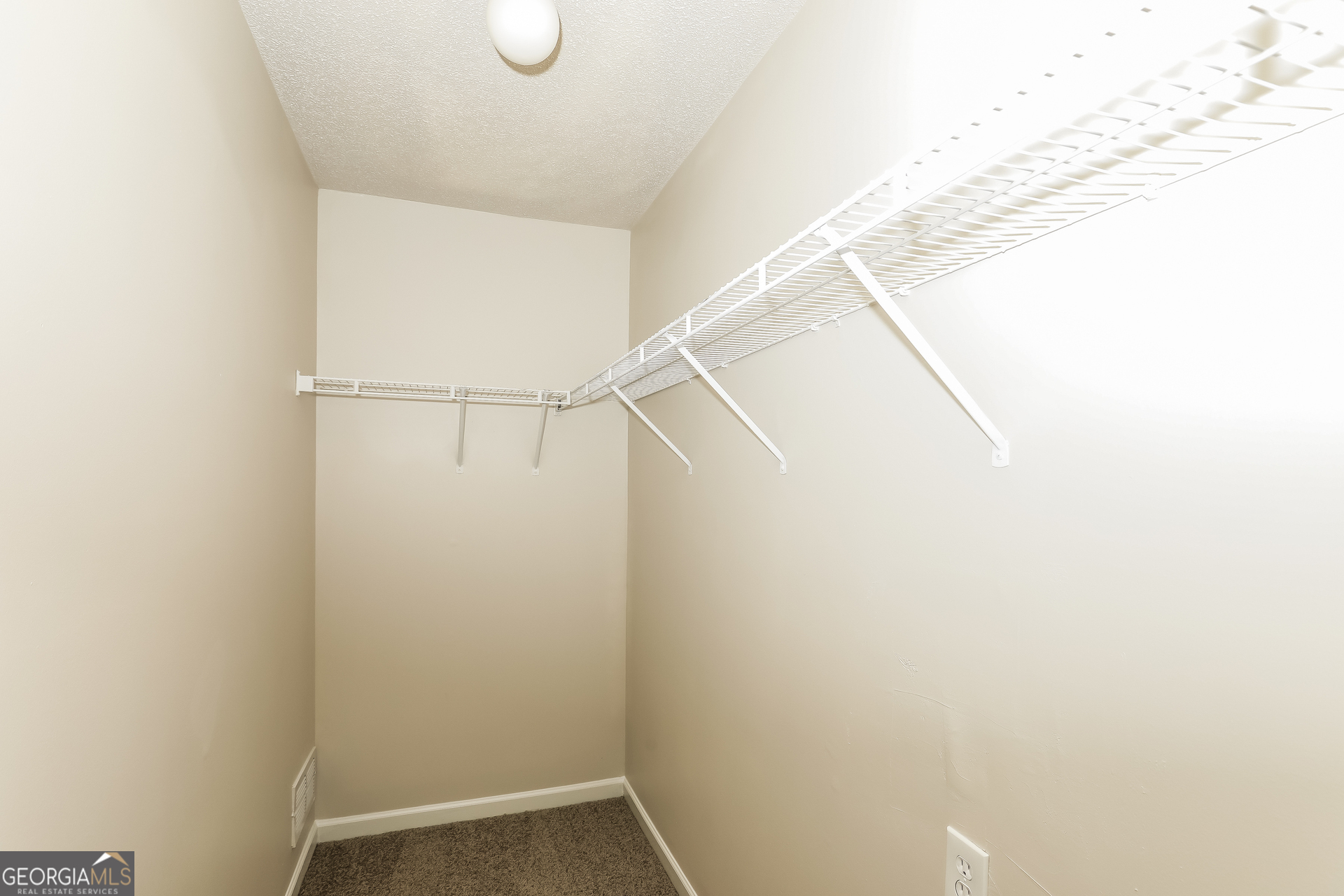 1915 Portwest Way Hampton, GA 30228 - Photo 10 of 16 a view of small space with racks on the wall