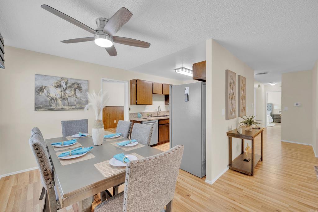 9430 Lake Canyon Road Santee, CA 92071 - Photo 18 of 52 a workspace with furniture and wooden floor