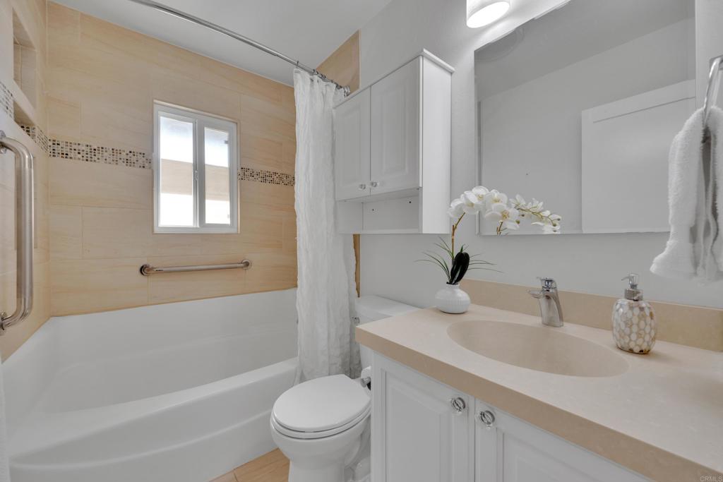 9430 Lake Canyon Road Santee, CA 92071 - Photo 20 of 52 a bathroom with a sink toilet and shower