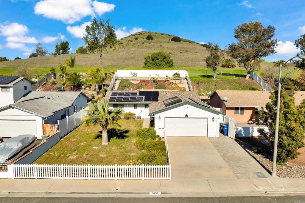 9430 Lake Canyon Road Santee, CA 92071 - Photo 2 of 52 an aerial view of a house with a swimming pool