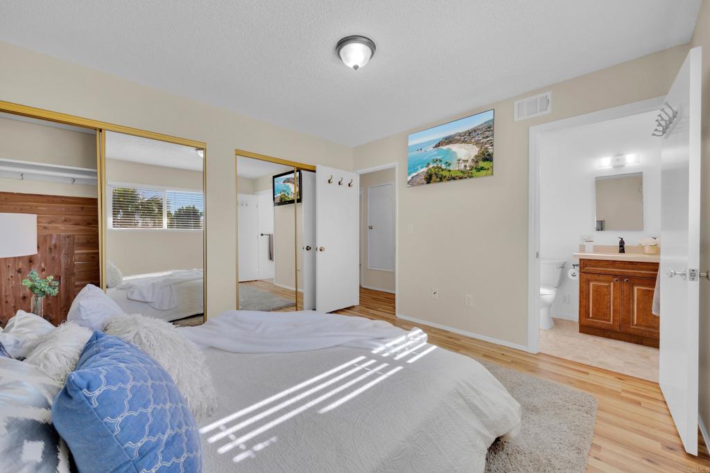 9430 Lake Canyon Road Santee, CA 92071 - Photo 25 of 52 a bedroom with a bed and a sink
