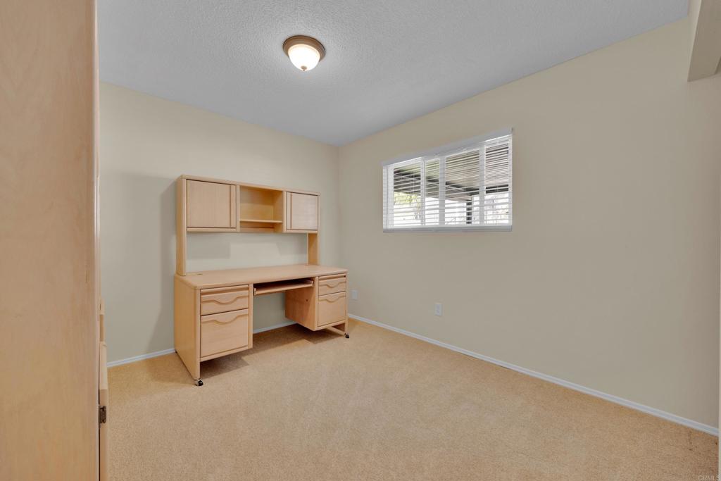 9430 Lake Canyon Road Santee, CA 92071 - Photo 27 of 52 a room with furniture and window