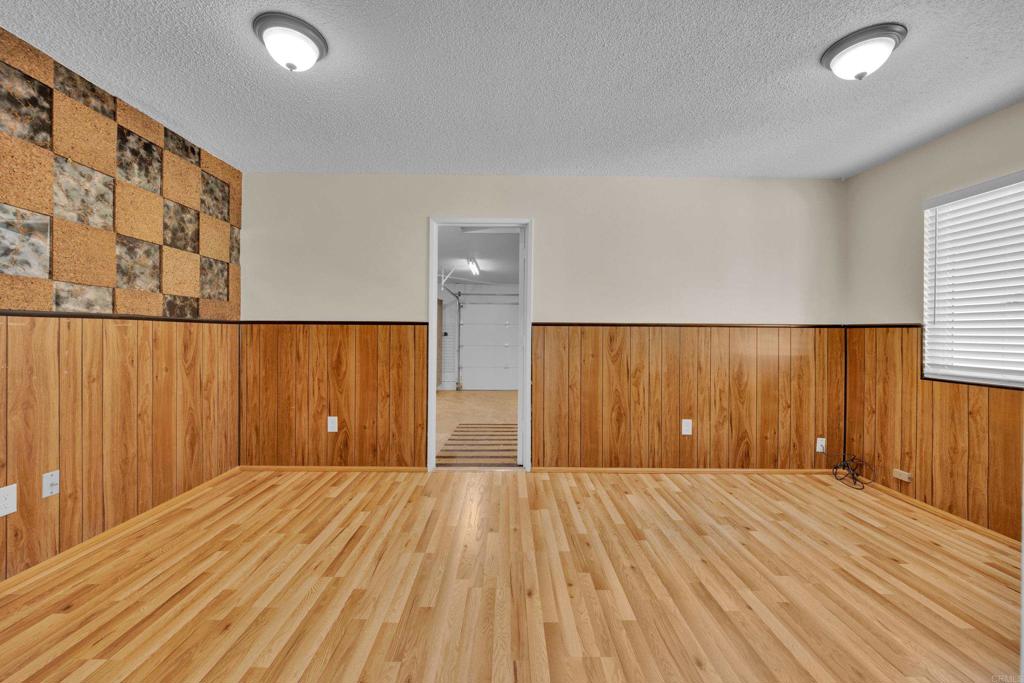 9430 Lake Canyon Road Santee, CA 92071 - Photo 34 of 52 wooden floor and bathroom with a sink