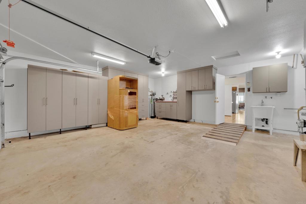 9430 Lake Canyon Road Santee, CA 92071 - Photo 36 of 52 a view of a hallway with a refrigerator