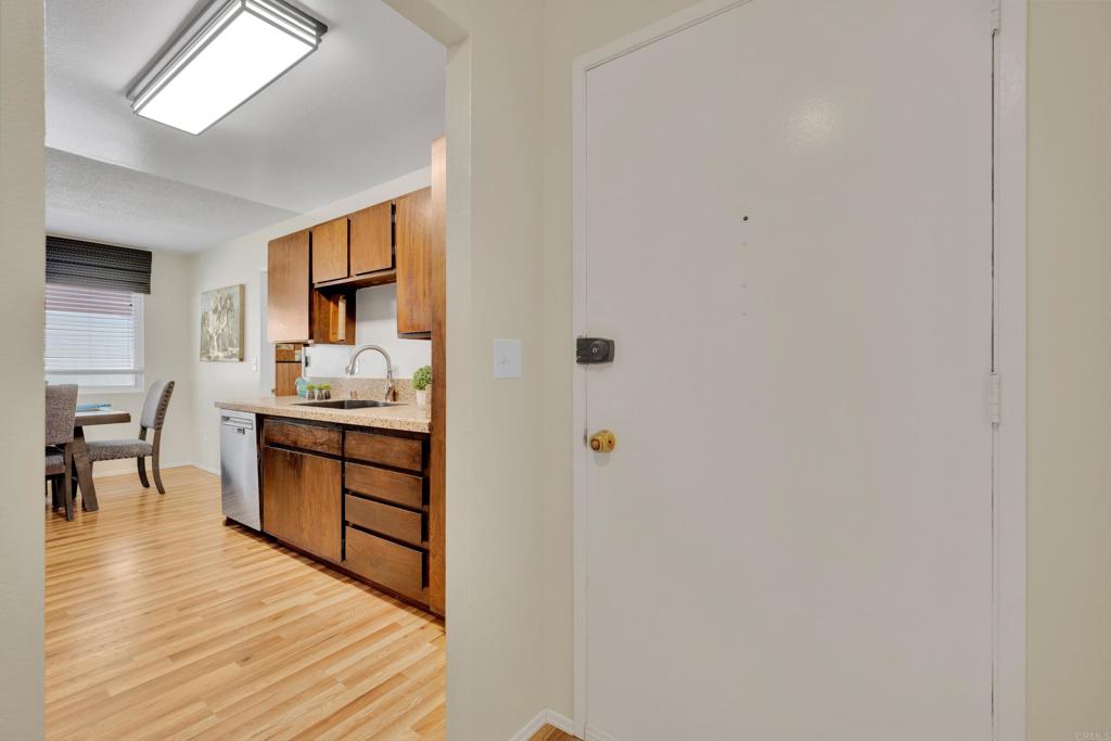 9430 Lake Canyon Road Santee, CA 92071 - Photo 8 of 52 a room with a bed and a view of kitchen