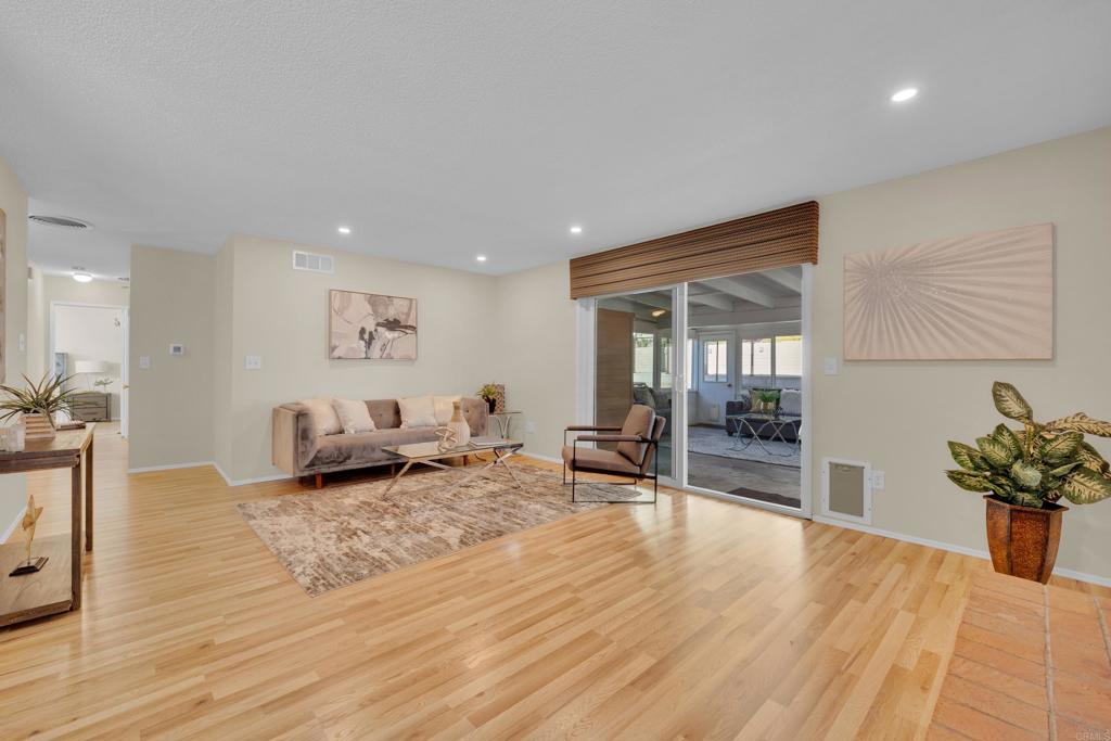 9430 Lake Canyon Road Santee, CA 92071 - Photo 9 of 52 a living room with furniture and wooden floor