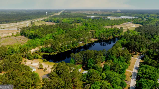 a view of a lake with a house