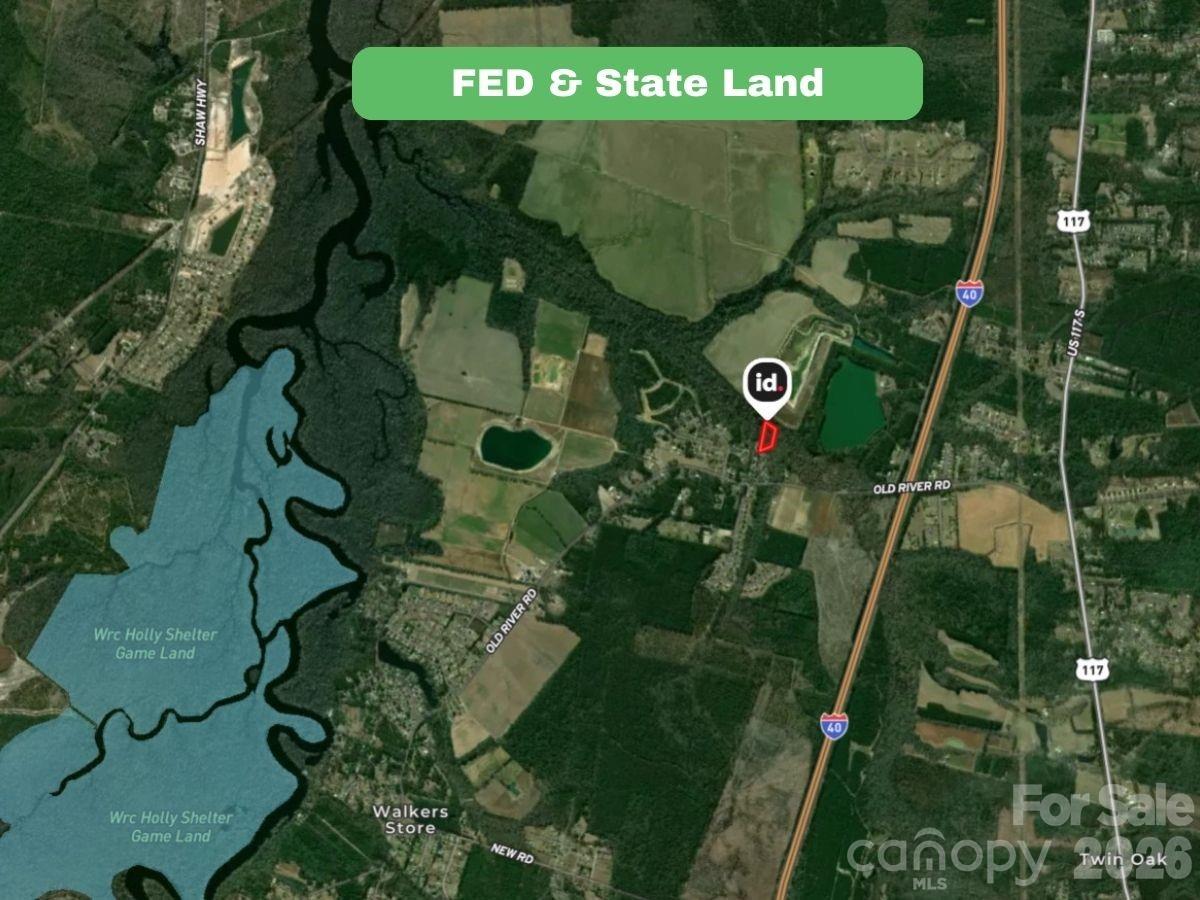 0 Roland Hills Burgaw, NC 28425 - Photo 19 of 21 a sign that is sitting on a tree