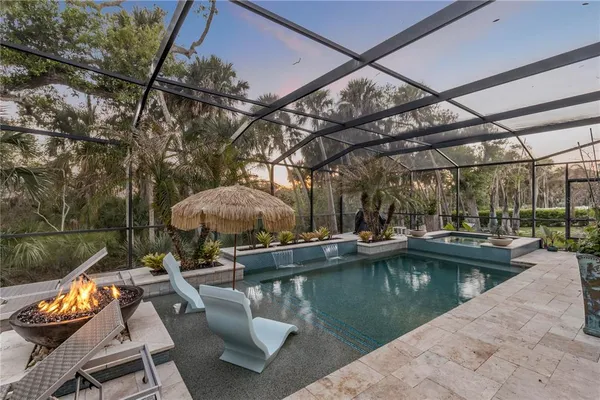 a view of a swimming pool with a patio