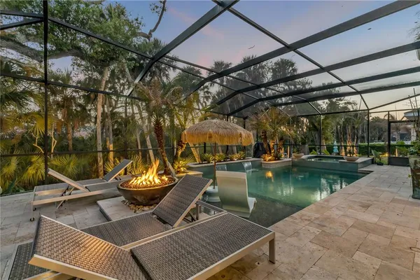 a view of a swimming pool with a patio