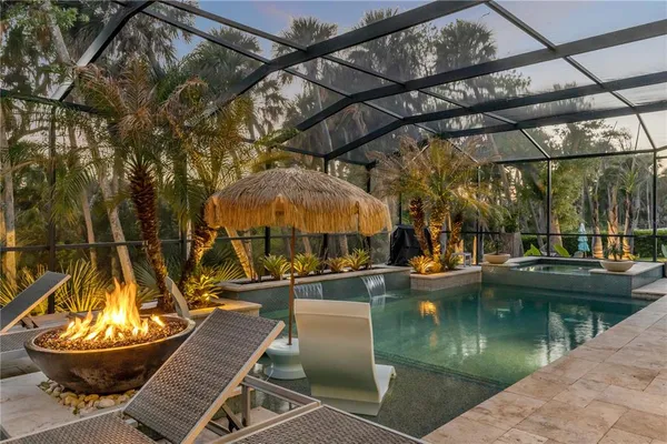 a view of a swimming pool with a patio
