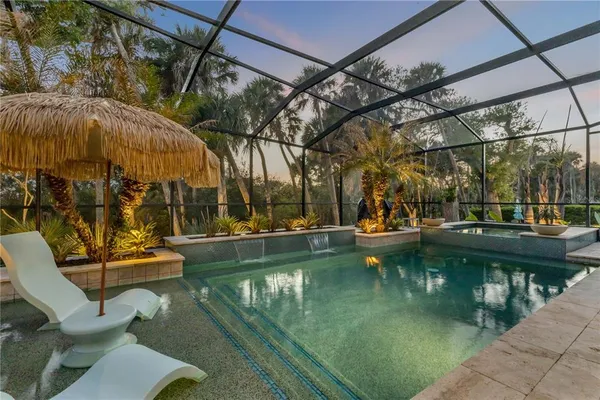 a view of a swimming pool with a patio