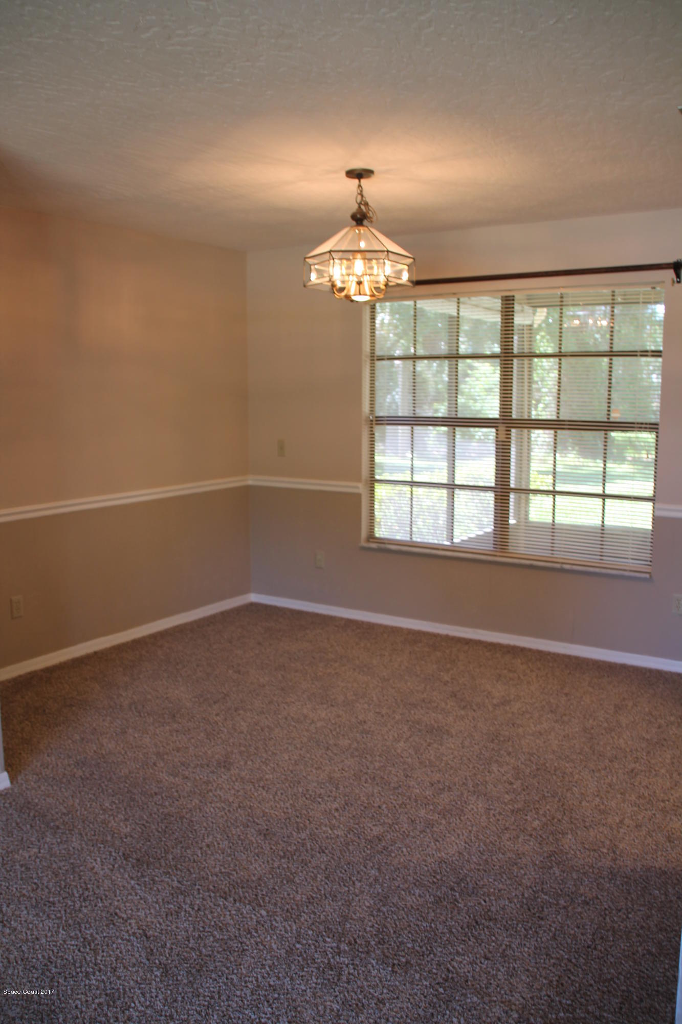 398 Hurst Road Northeast Palm Bay, FL 32907 - Photo 12 of 22 Dinning Room View 2