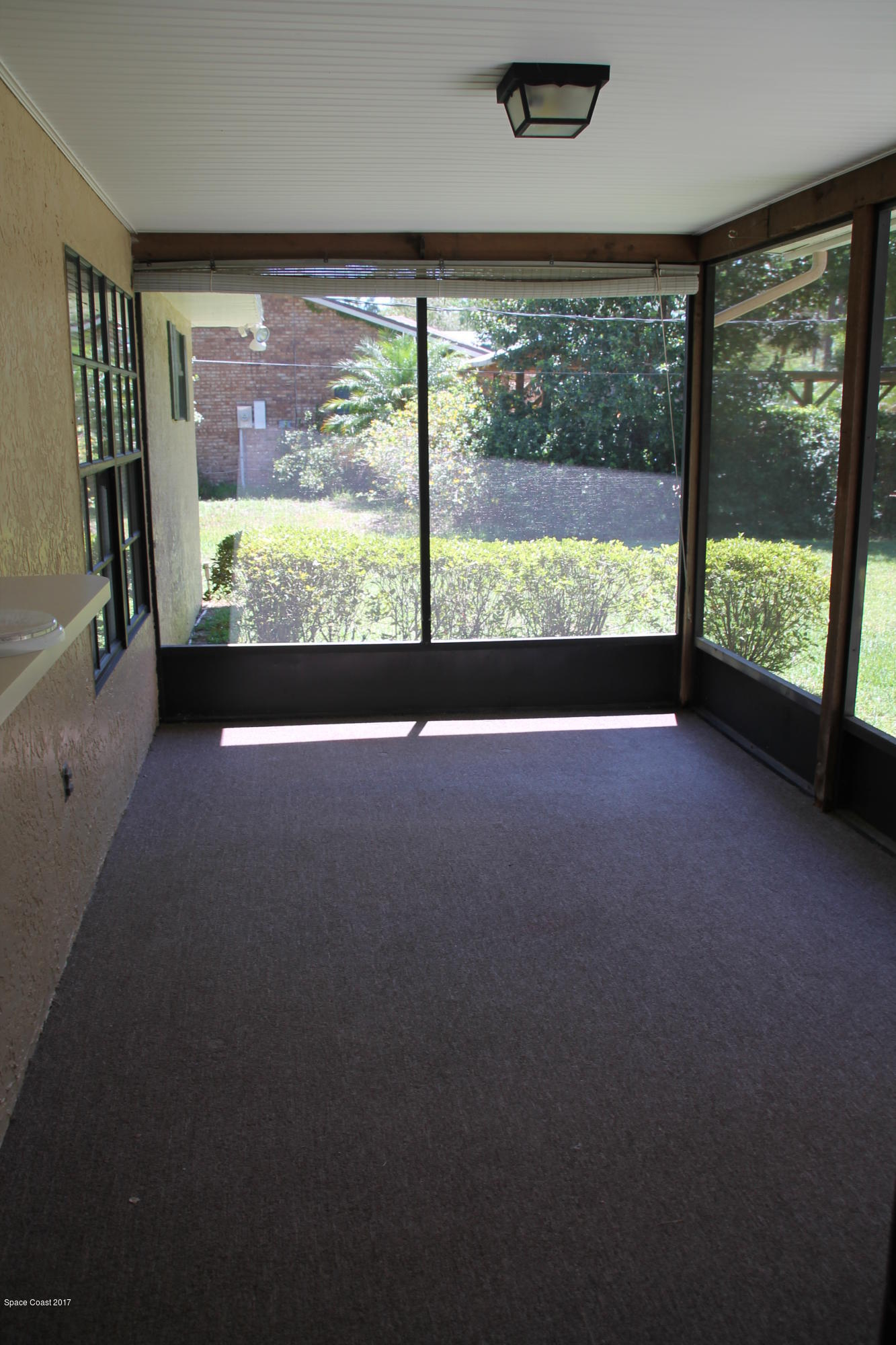 398 Hurst Road Northeast Palm Bay, FL 32907 - Photo 19 of 22 Screened Patio