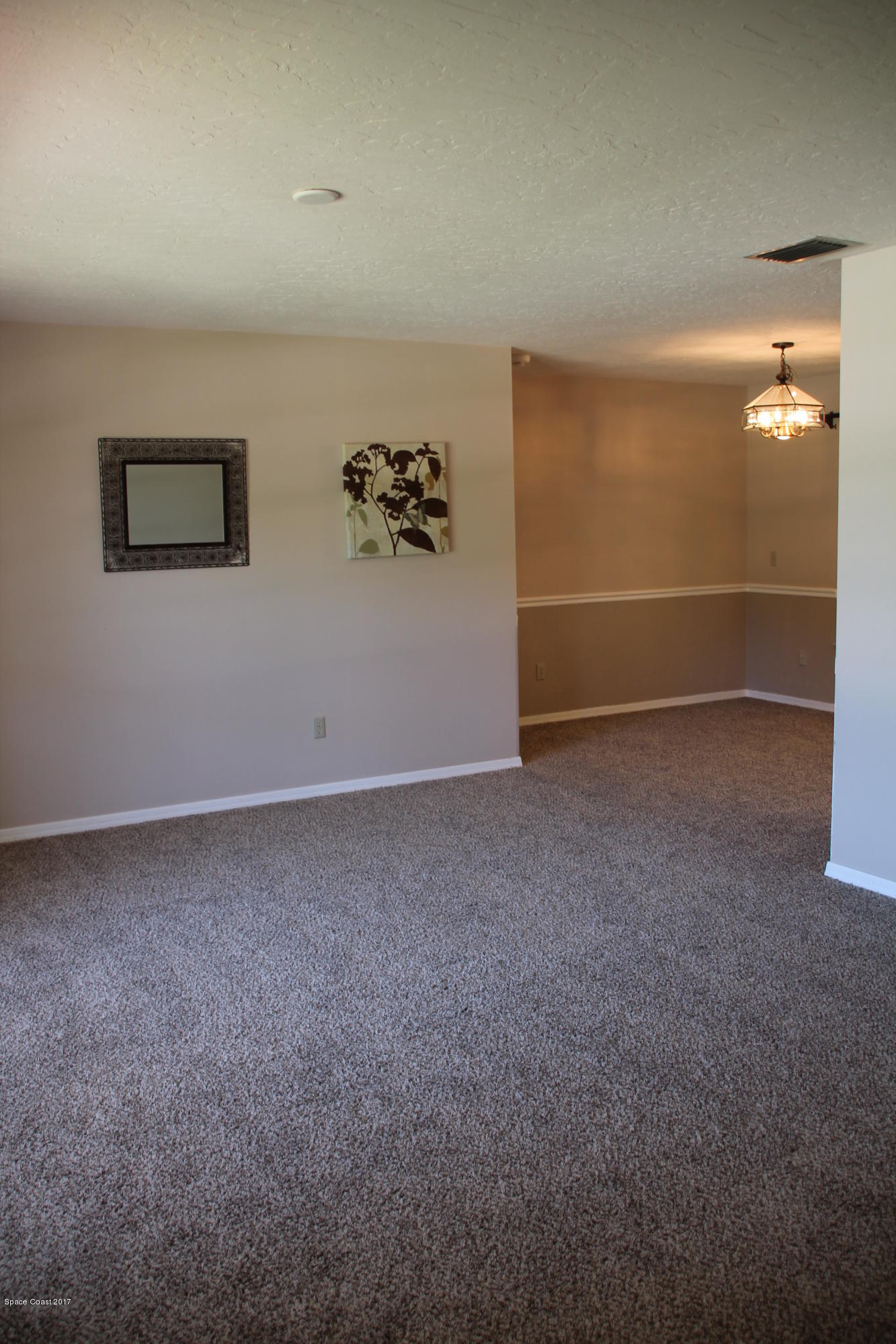 398 Hurst Road Northeast Palm Bay, FL 32907 - Photo 10 of 22 Living Room View 2