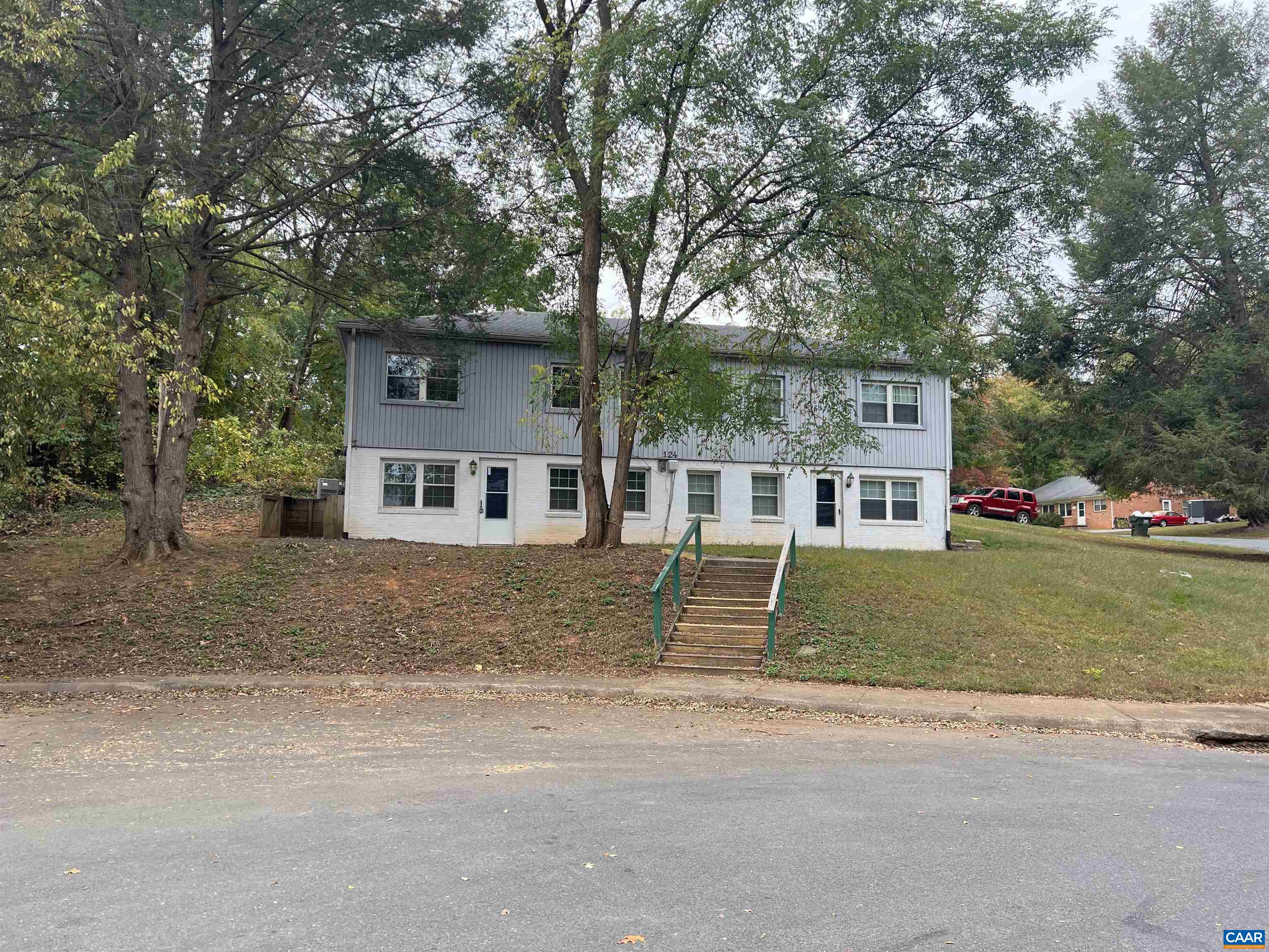 front view of a house with a yard