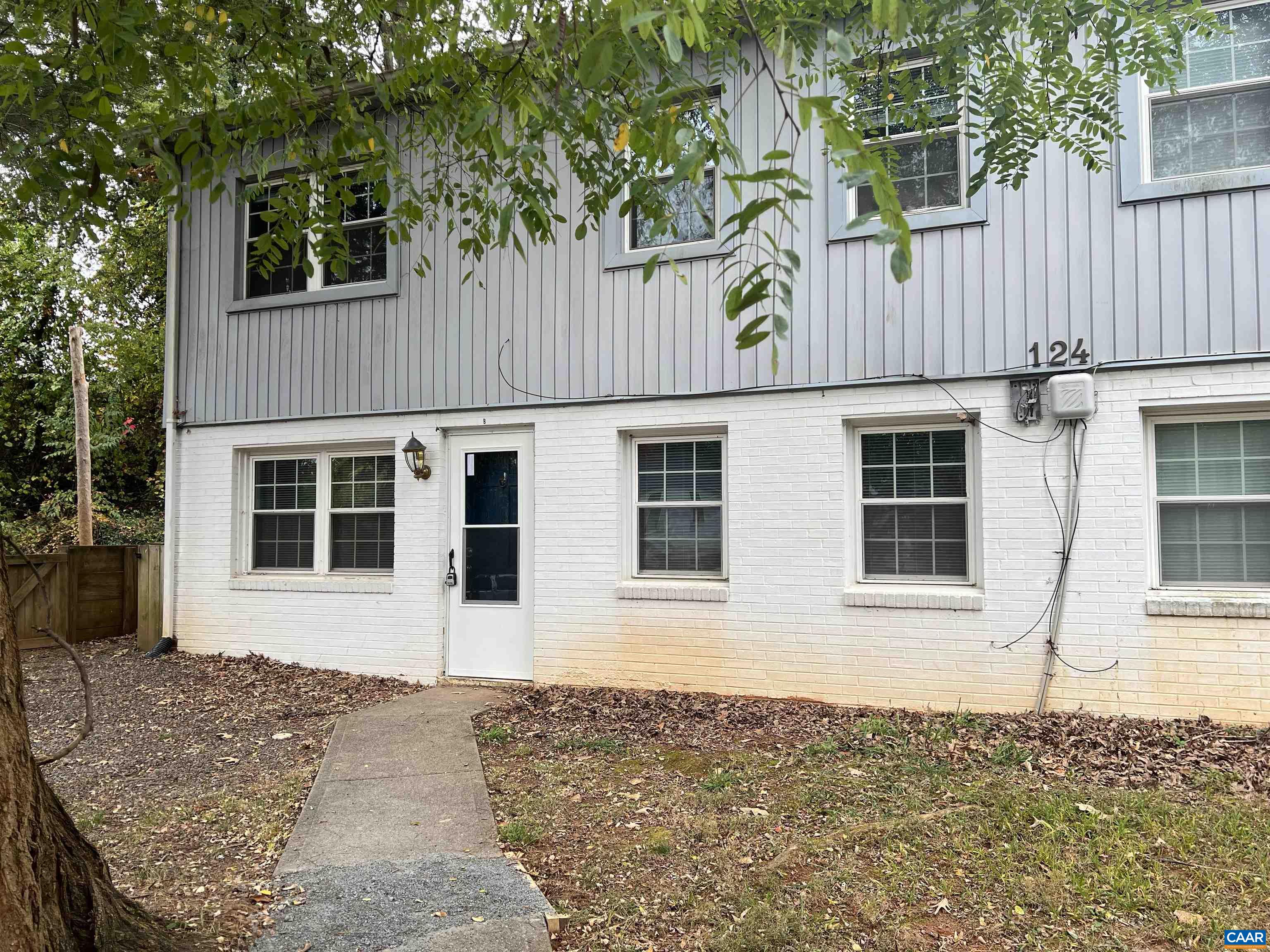 124 Middlesex Drive, Unit B Charlottesville, VA 22901 - Photo 15 of 38 front view of a house with a yard