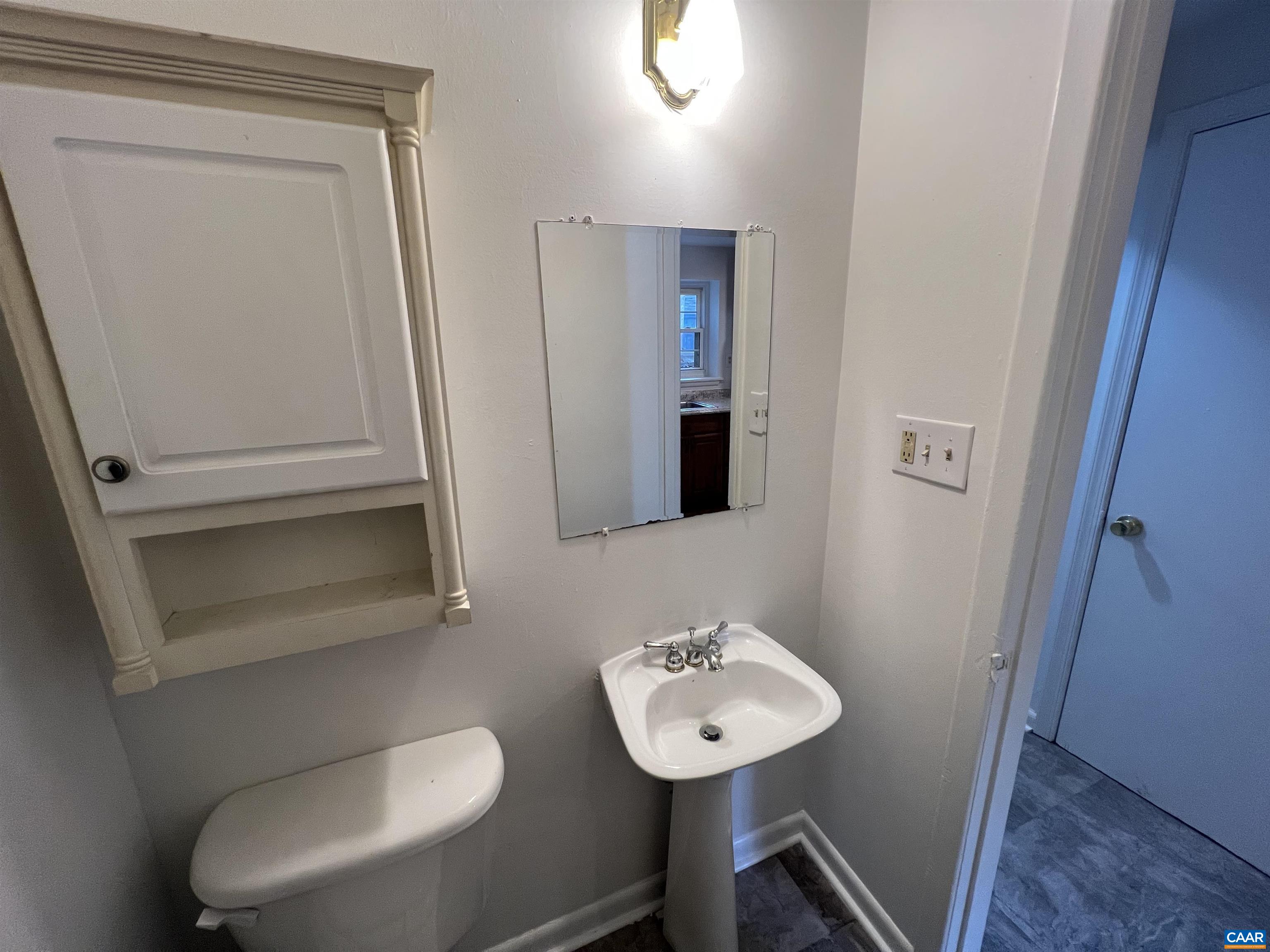 124 Middlesex Drive, Unit B Charlottesville, VA 22901 - Photo 16 of 38 a bathroom with a sink and mirror