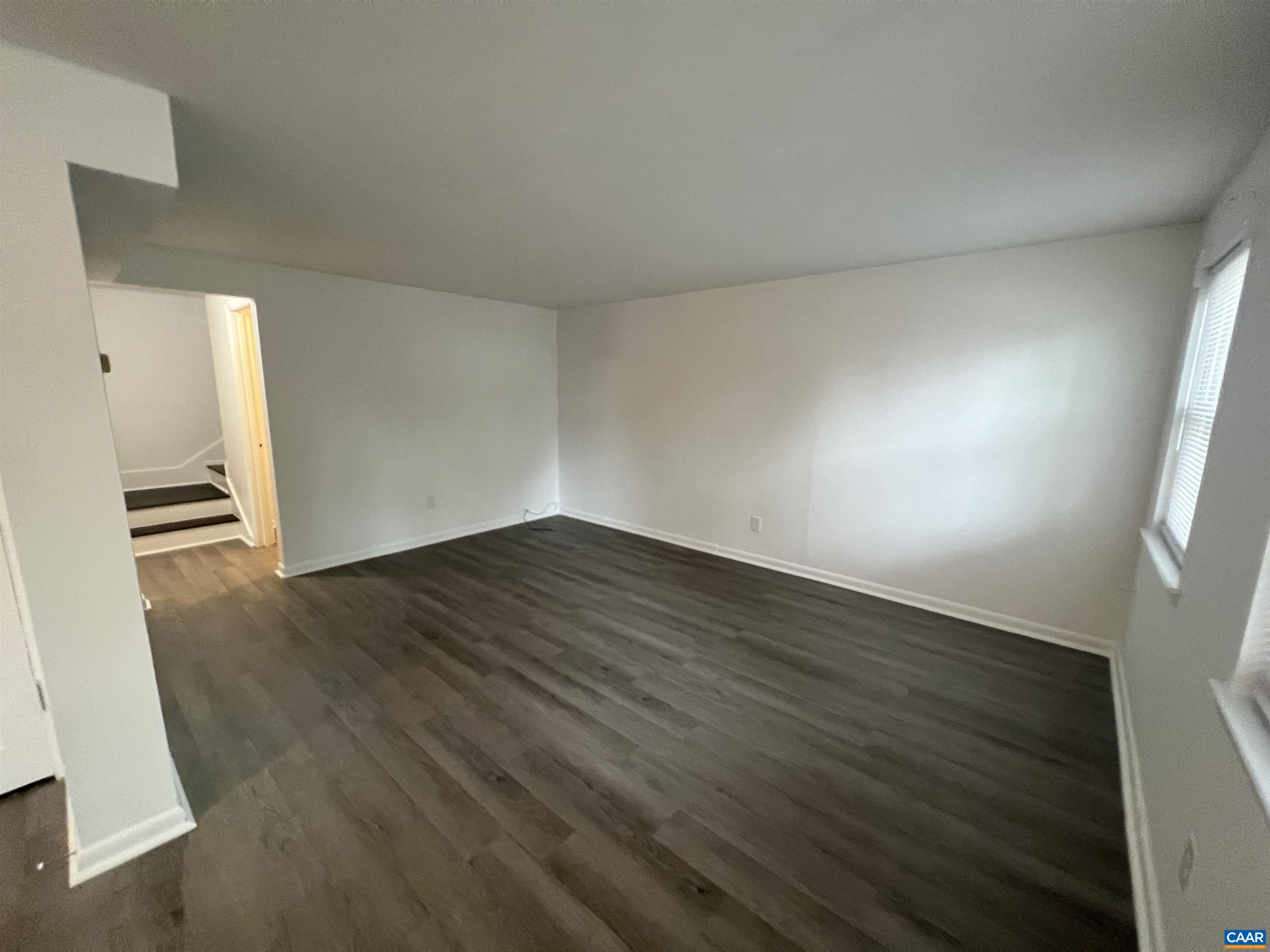 124 Middlesex Drive, Unit B Charlottesville, VA 22901 - Photo 29 of 38 wooden floor in an empty room