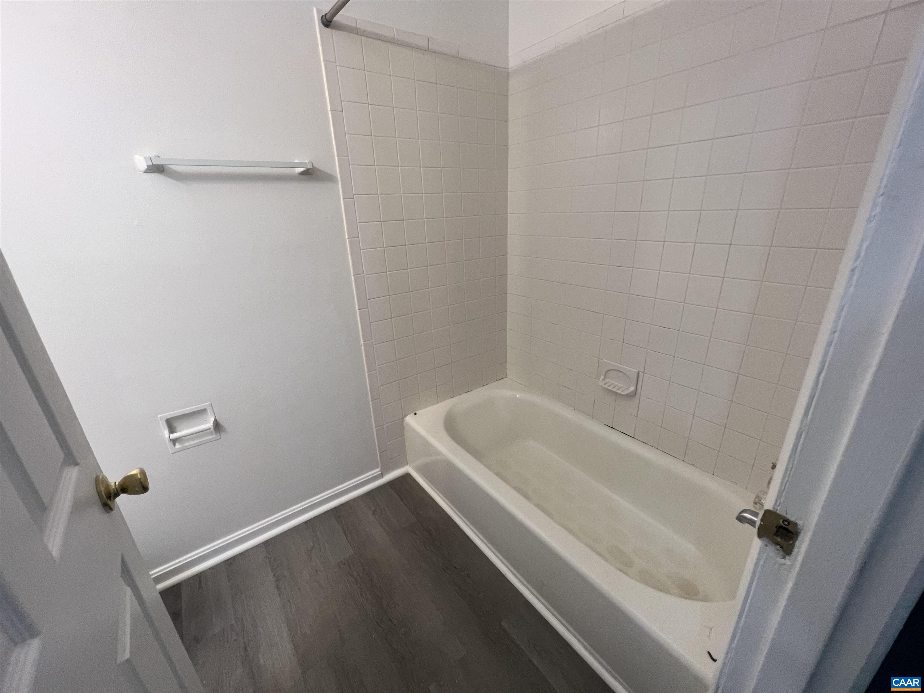 124 Middlesex Drive, Unit B Charlottesville, VA 22901 - Photo 35 of 38 a bathroom with a tub and shower