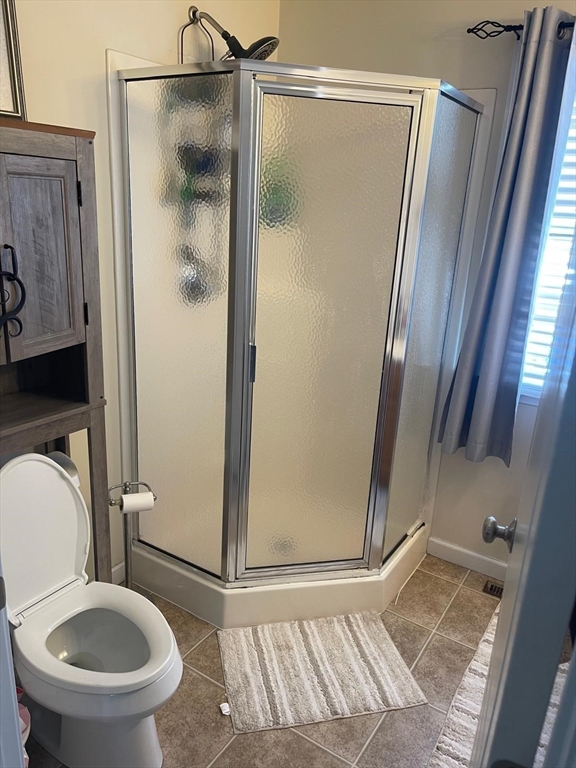 19 Annies Way Springfield, MA 01119 - Photo 11 of 41 a bathroom with a granite countertop shower and a toilet