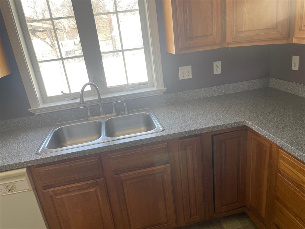 19 Annies Way Springfield, MA 01119 - Photo 12 of 41 a kitchen with a sink and cabinets
