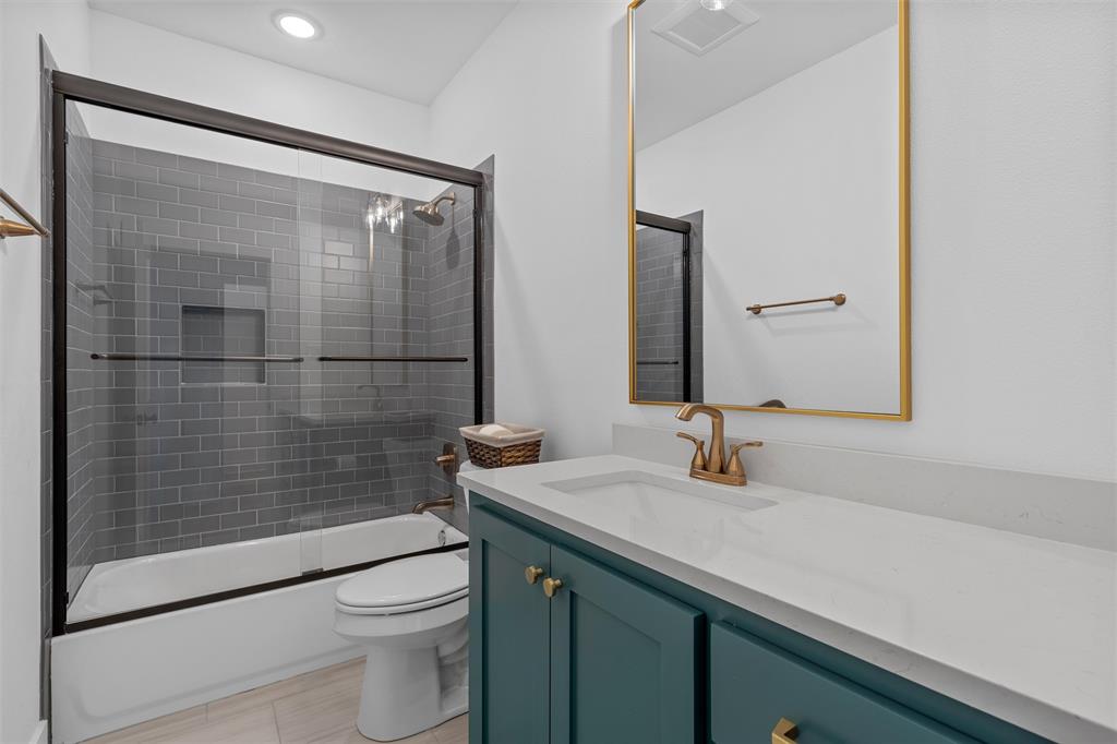 216 Wycliff Drive China Spring, TX 76633 - Photo 29 of 40 a bathroom with a sink a toilet and shower