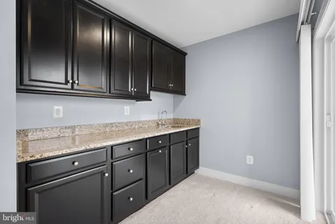 a view of a room with racks on the wall