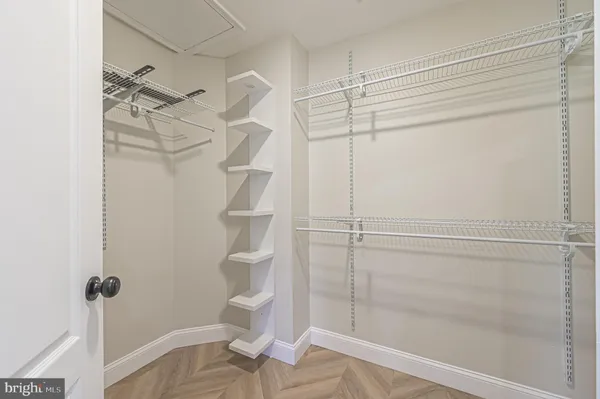 a view of a room with racks on the wall