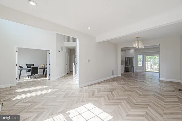 a view of a livingroom with a staircase