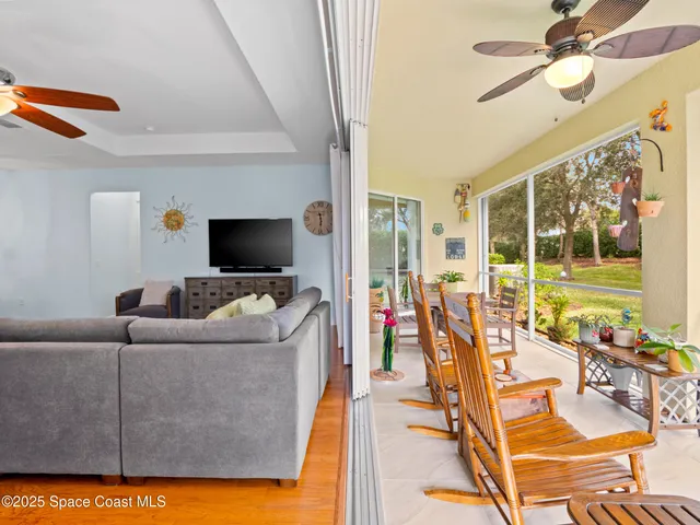 a spacious bathroom with a granite countertop sink mirror and bathtub