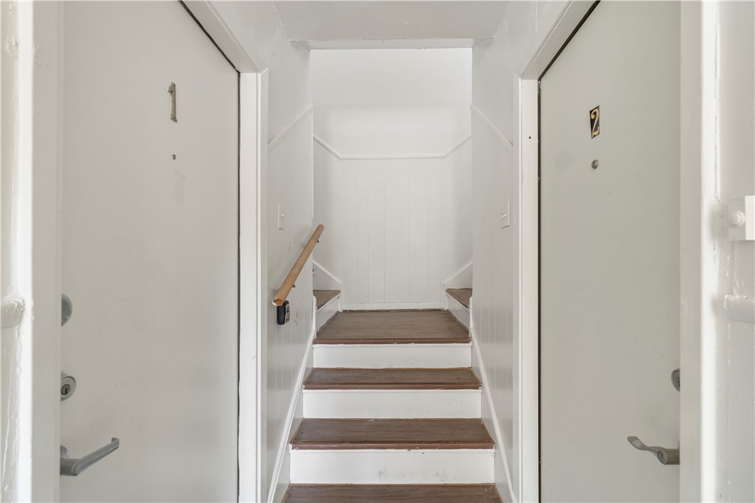 1012-1014 East 23rd Street Bryan, TX 77803 - Photo 20 of 22 a view of staircase with white walls