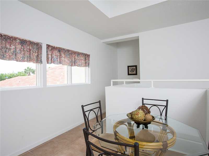 576 7th Square Southwest, Unit 202 Vero Beach, FL 32962 - Photo 20 of 28 a living room with furniture and a window