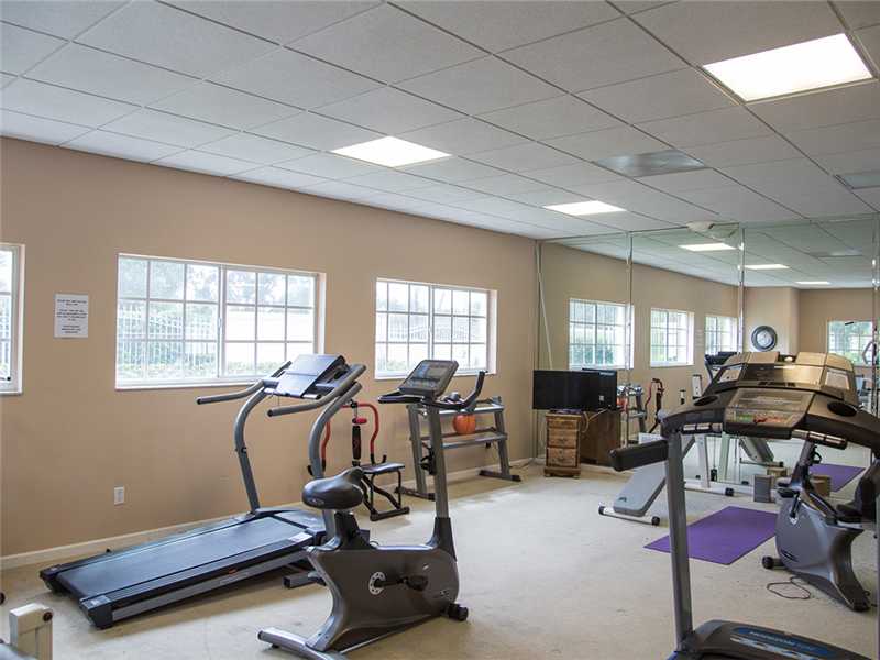576 7th Square Southwest, Unit 202 Vero Beach, FL 32962 - Photo 25 of 28 a view of a room with gym equipment