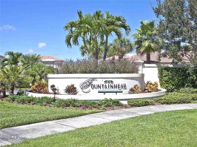 576 7th Square Southwest, Unit 202 Vero Beach, FL 32962 - Photo 28 of 28 a sign on the side of the road