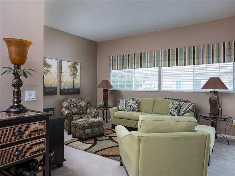 576 7th Square Southwest, Unit 202 Vero Beach, FL 32962 - Photo 5 of 28 a living room with furniture and a window