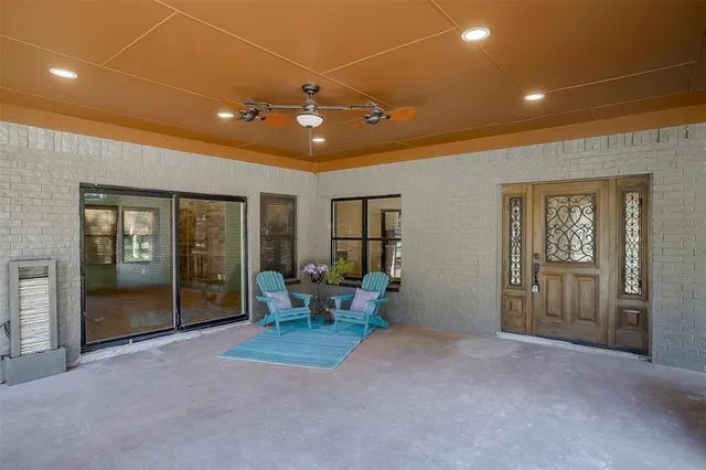 a view of a livingroom with natural light