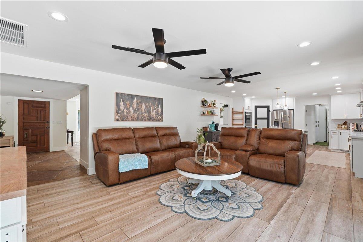 4849 Alexon Way Carmichael, CA 95608 - Photo 12 of 50 a living room with furniture and a wooden floor