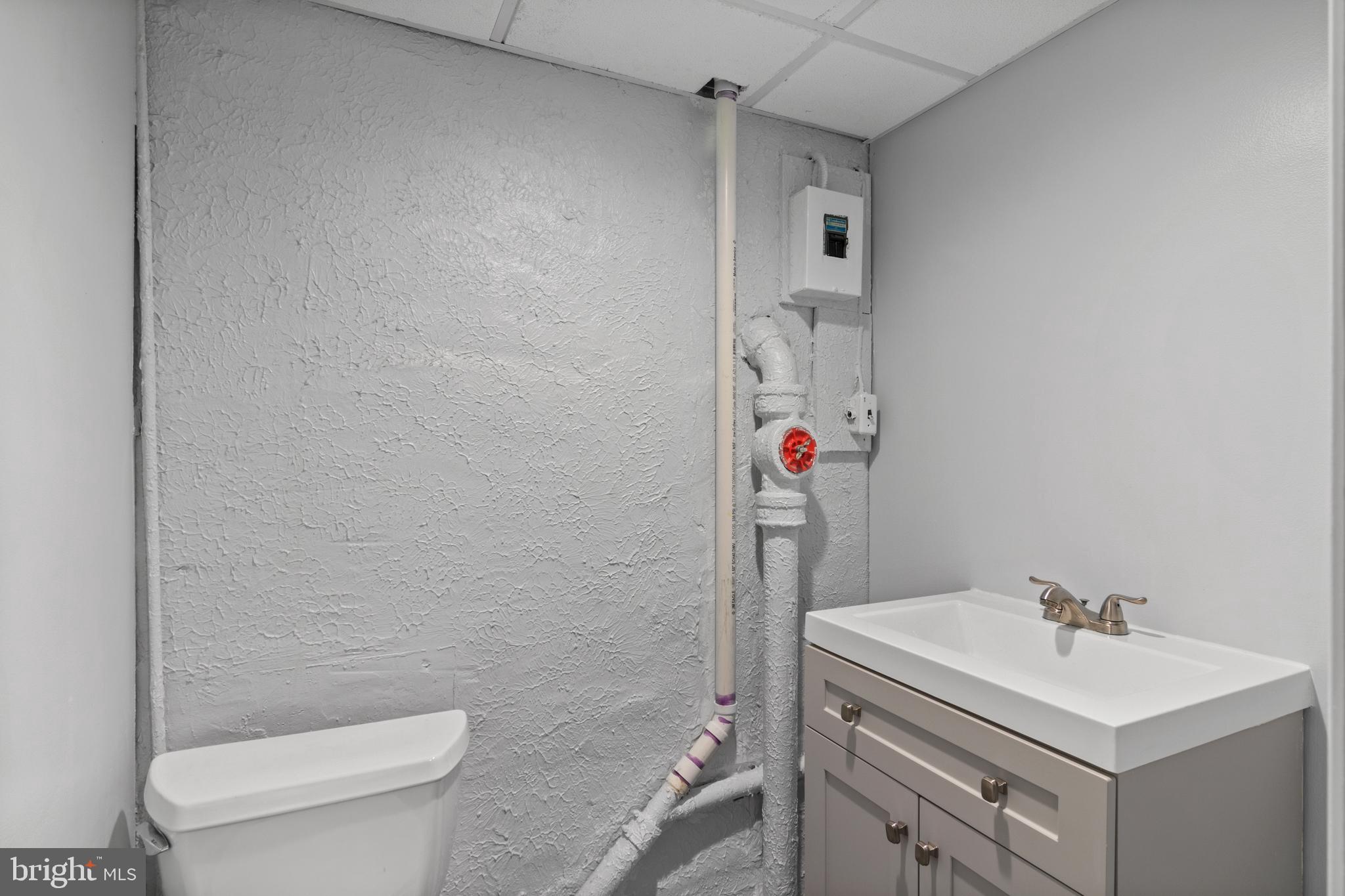 9233 Riggs Road Adelphi, MD 20783 - Photo 23 of 30 Half Bathroom in basement