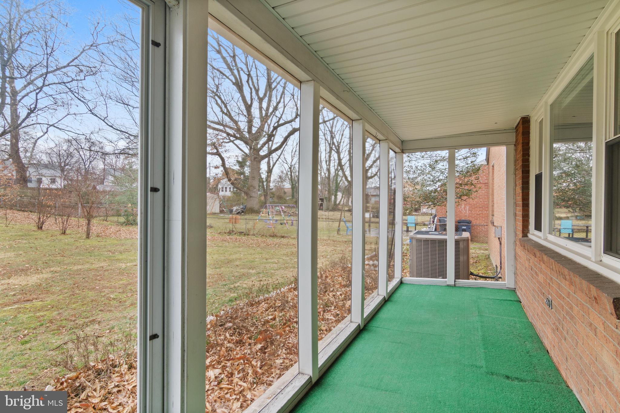 9233 Riggs Road Adelphi, MD 20783 - Photo 24 of 30 Screened in back porch
