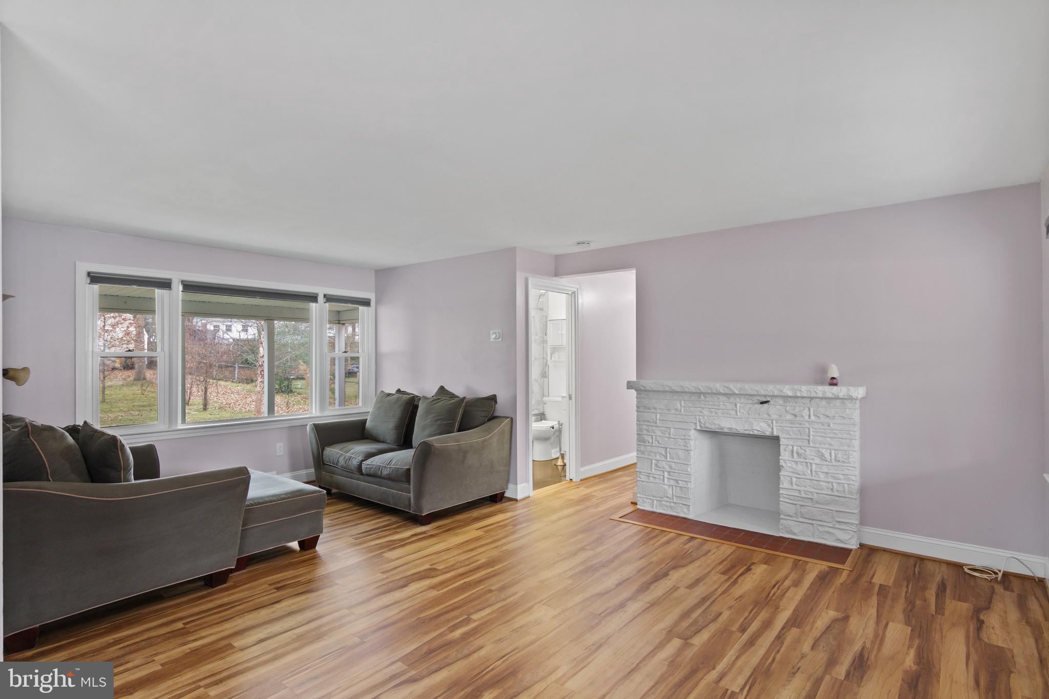9233 Riggs Road Adelphi, MD 20783 - Photo 6 of 30 Living Room with fireplace