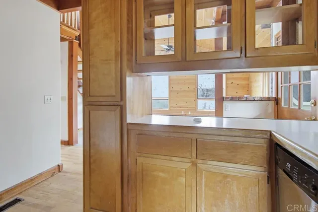 a bathroom with a sink and a window
